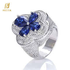 NUOAY Shiny Blue Gemstone Flower Shape Rings White Gold Plated Hip Hop Jewelry Iced Out Four Leaf Diamond Ring for Women