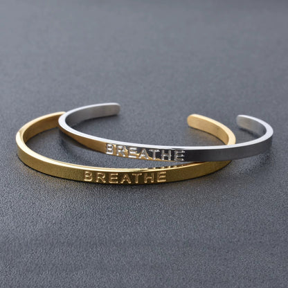 High Quality Engraved Words Logo Gold Plated Woman Mens Custom Logo Stainless Steel Bracelet Gold Cuff Bangle - MCROONS.COM